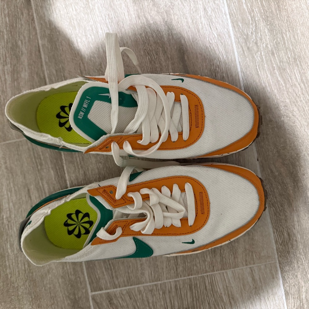 White and Orange Sneakers with Green Accents